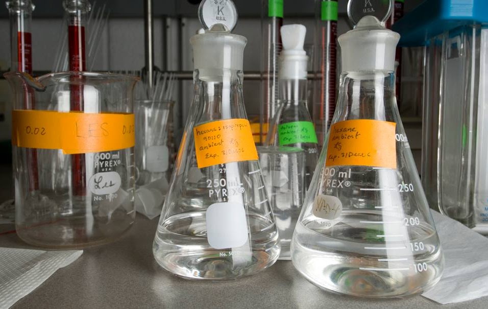 clear glass scientific looking beakers