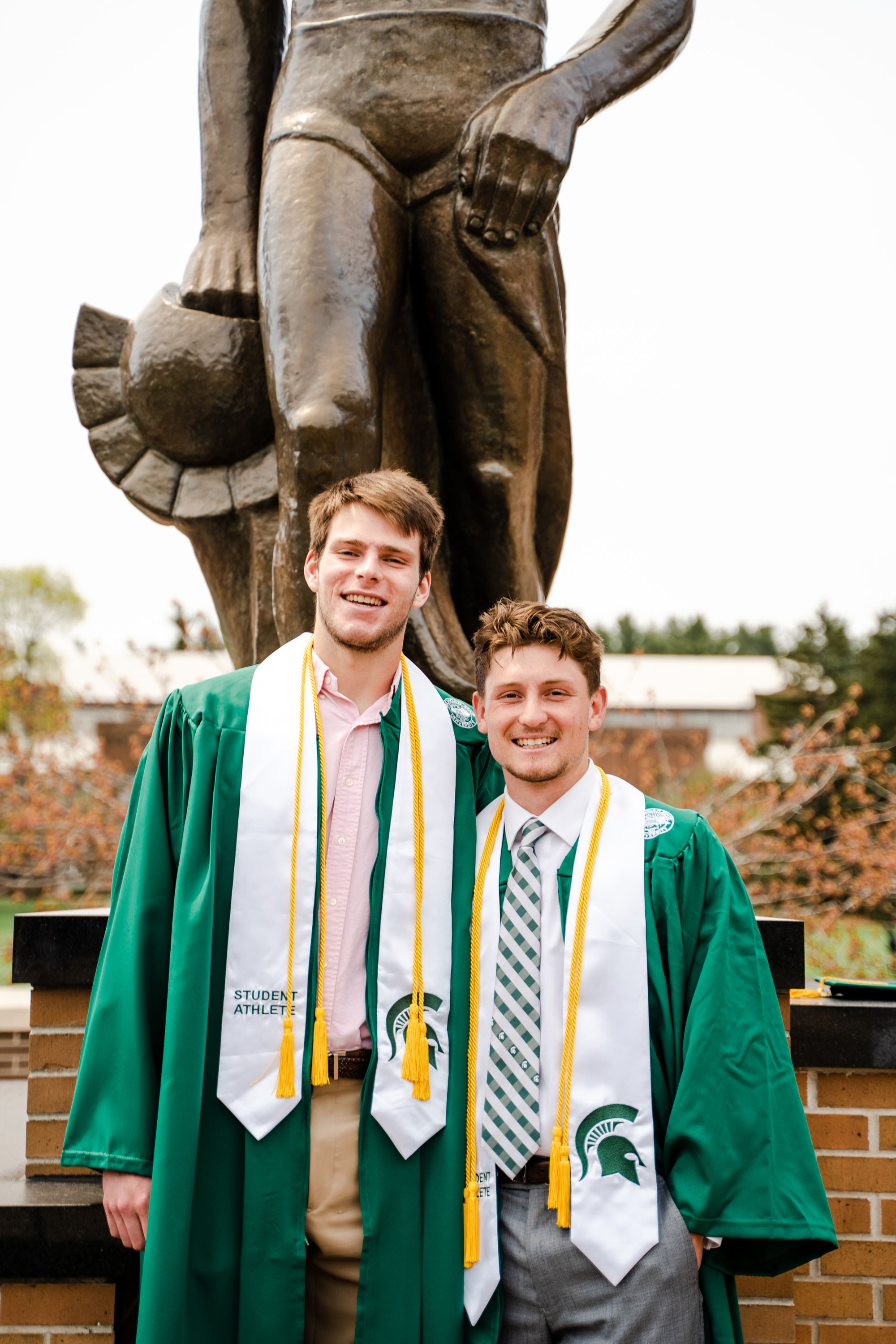A picture of Carson Gates with his roommate Nick Williams during graduation.